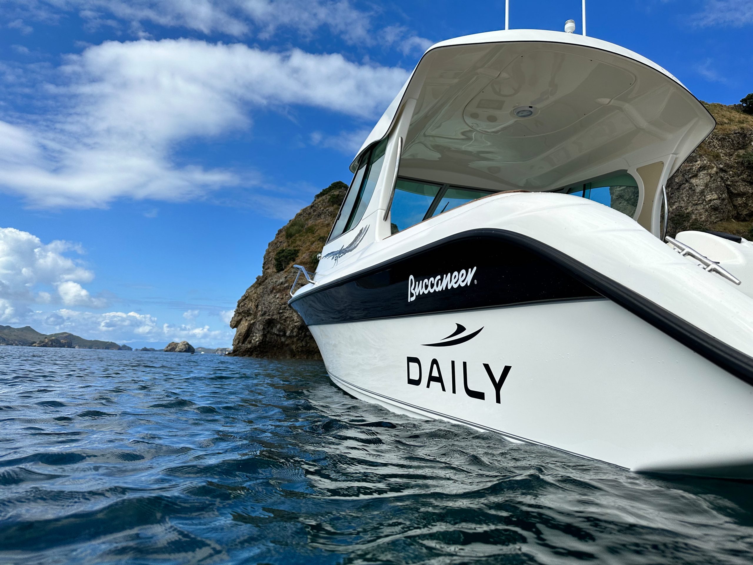 Bow of a Daily Boats Buccaneer 635 HT in clear water near the Hauraki Gulf islands