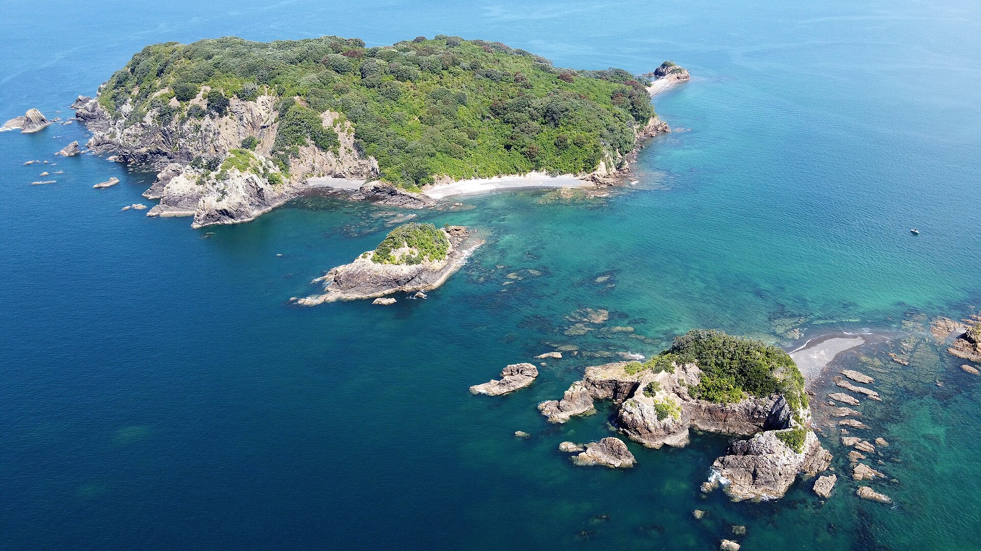 Aerial view of Ōtata, Sunday and Scott islands in the Noises group, Hauraki Gulf