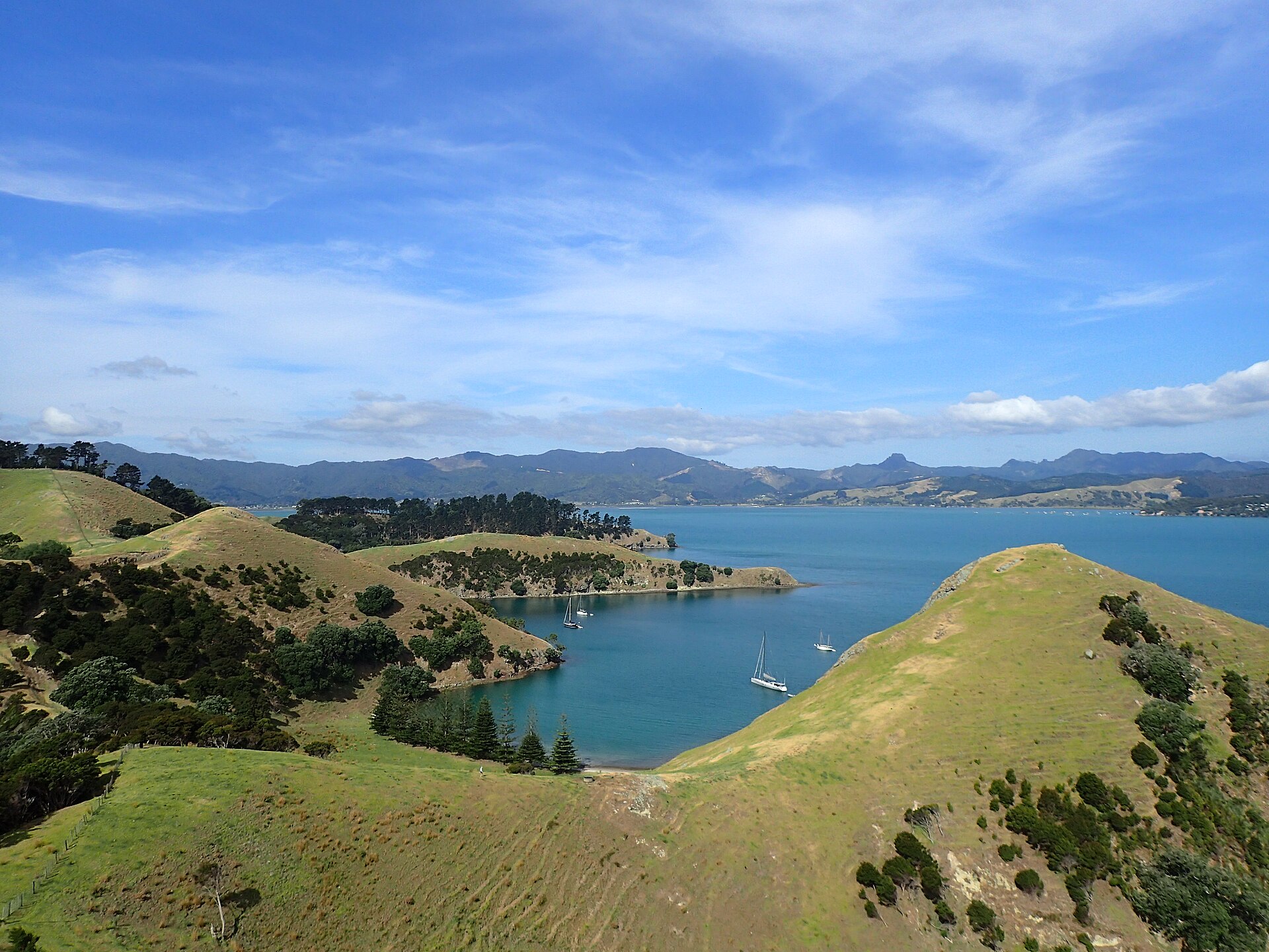 Yachts anchored off Whanganui Island, with Woolshed Bay beyond, Coromandel Harbour